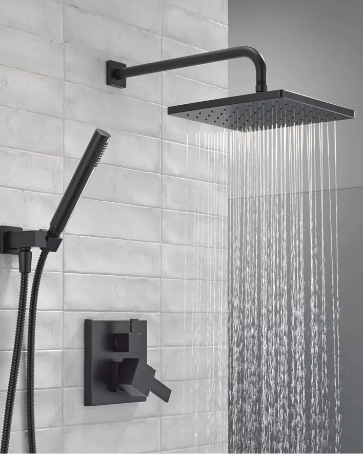 Delta matte black Square Pressure Balance Shower Kit working in shower stall with light grey tile. 